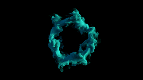 Pyro smoke shaped into a turquoise vortex ring